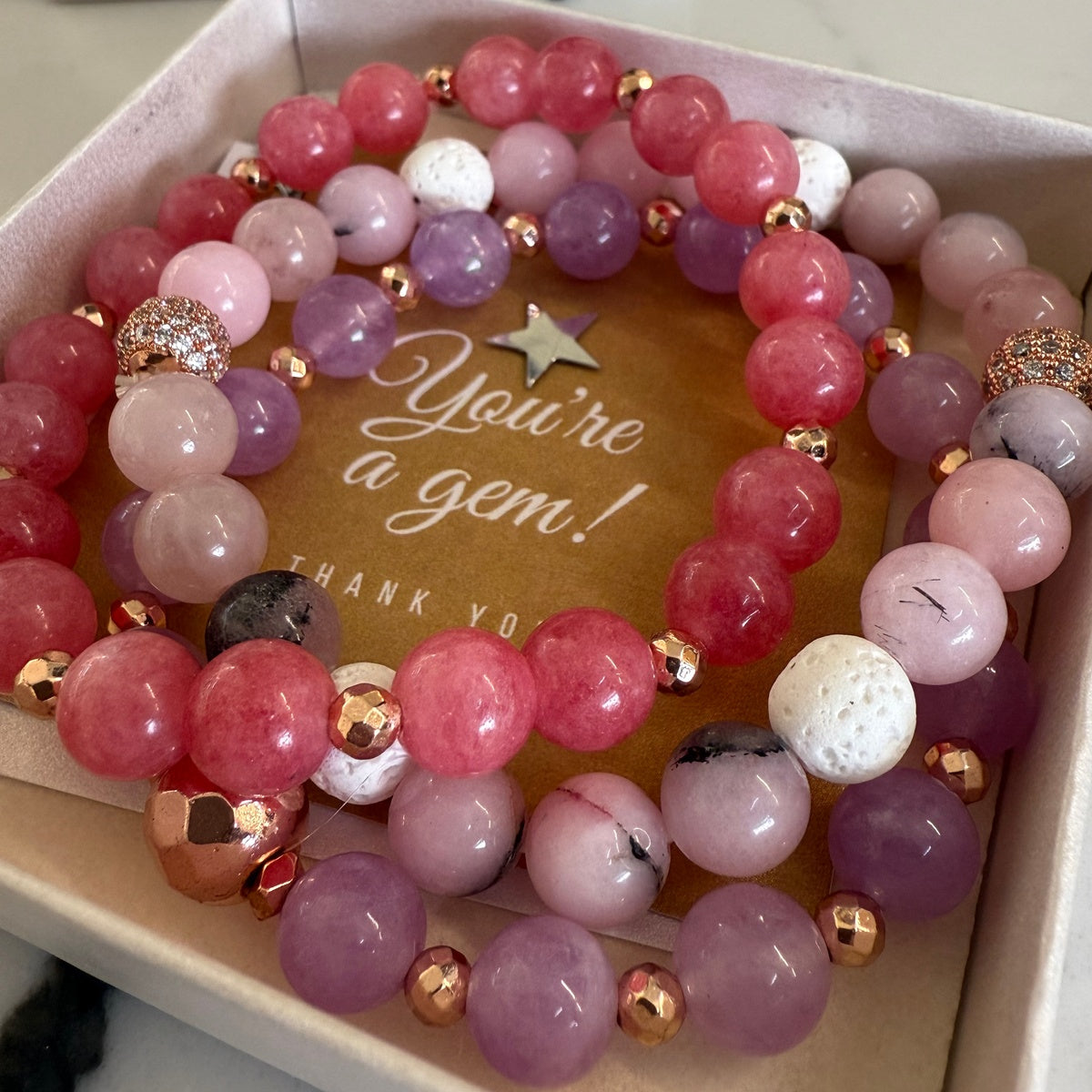 Set of pink natural stone bracelets