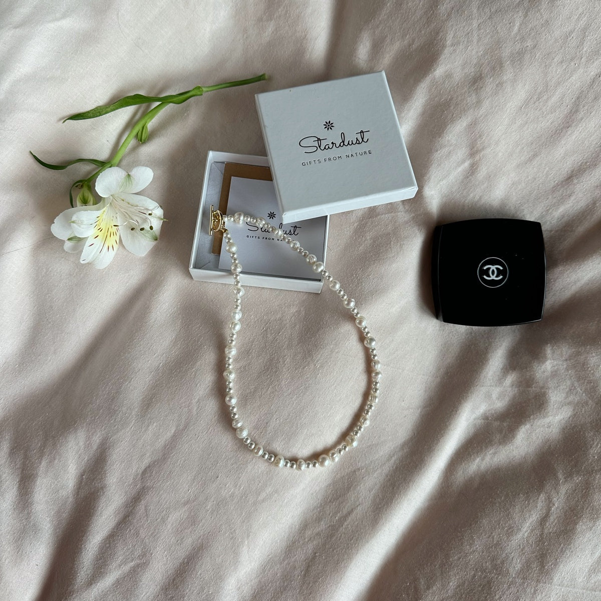 Stylish white pearl choker with toggle gold plated clasp