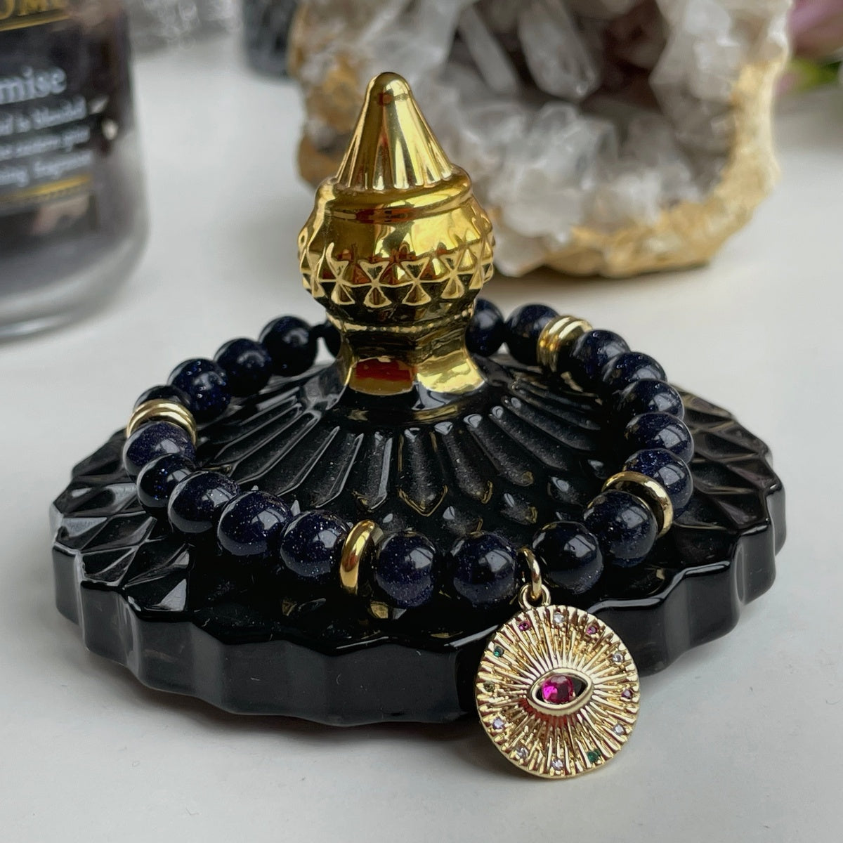Black Goldstone Bracelet | Antique Gold Eye Charm & Pink Zirconia