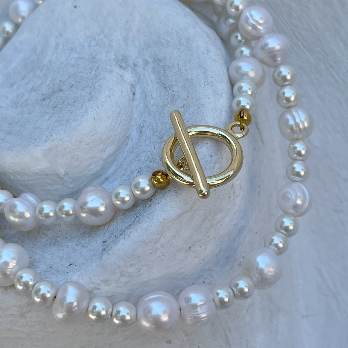 Stylish white pearl choker with toggle gold plated clasp