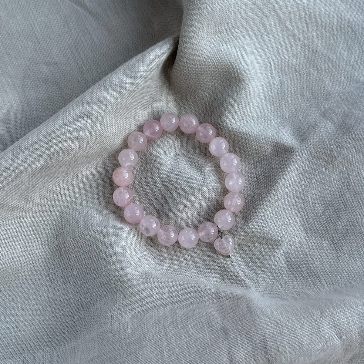 Rose Quartz beaded bracelet 10mm with heart charm