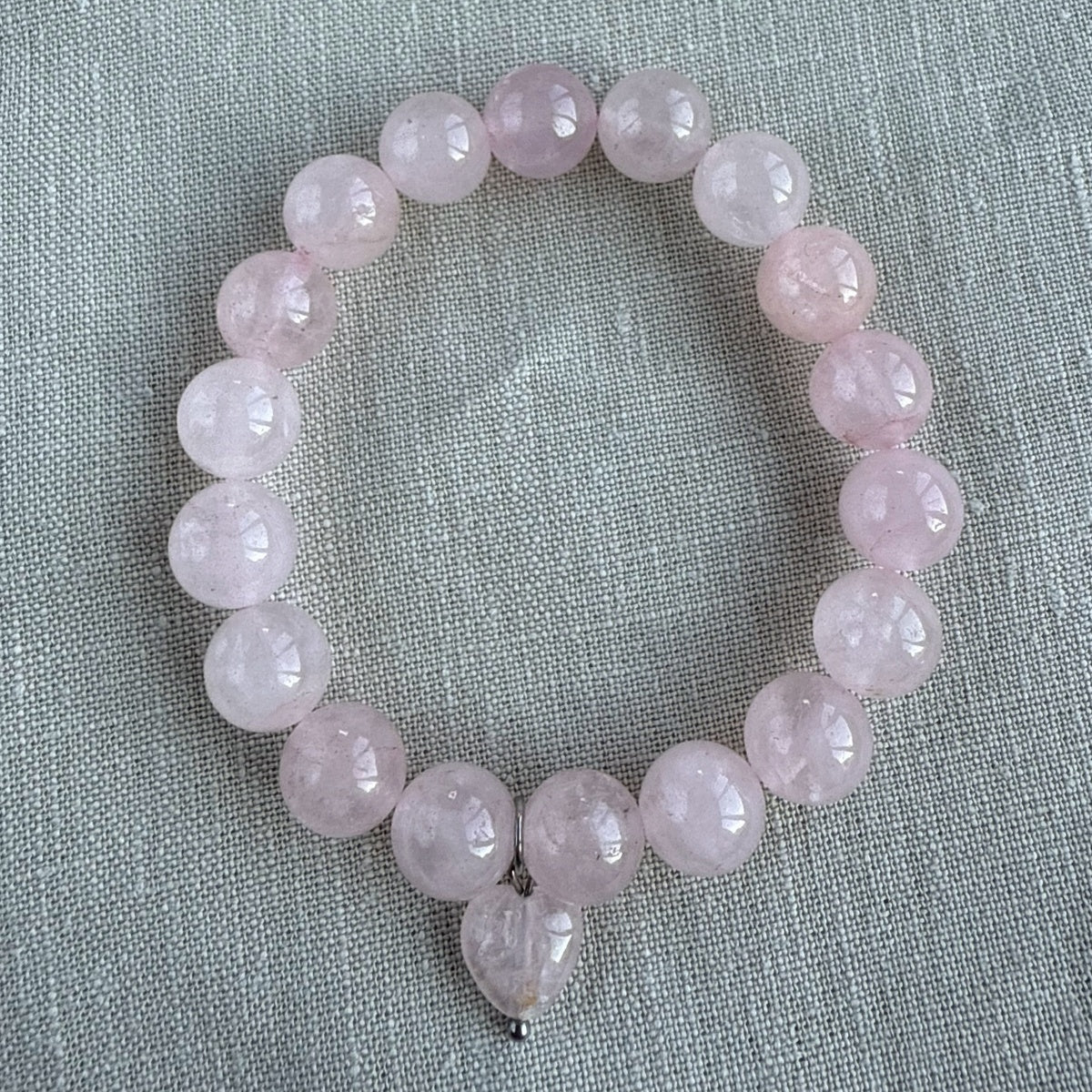 Rose Quartz beaded bracelet 10mm with heart charm