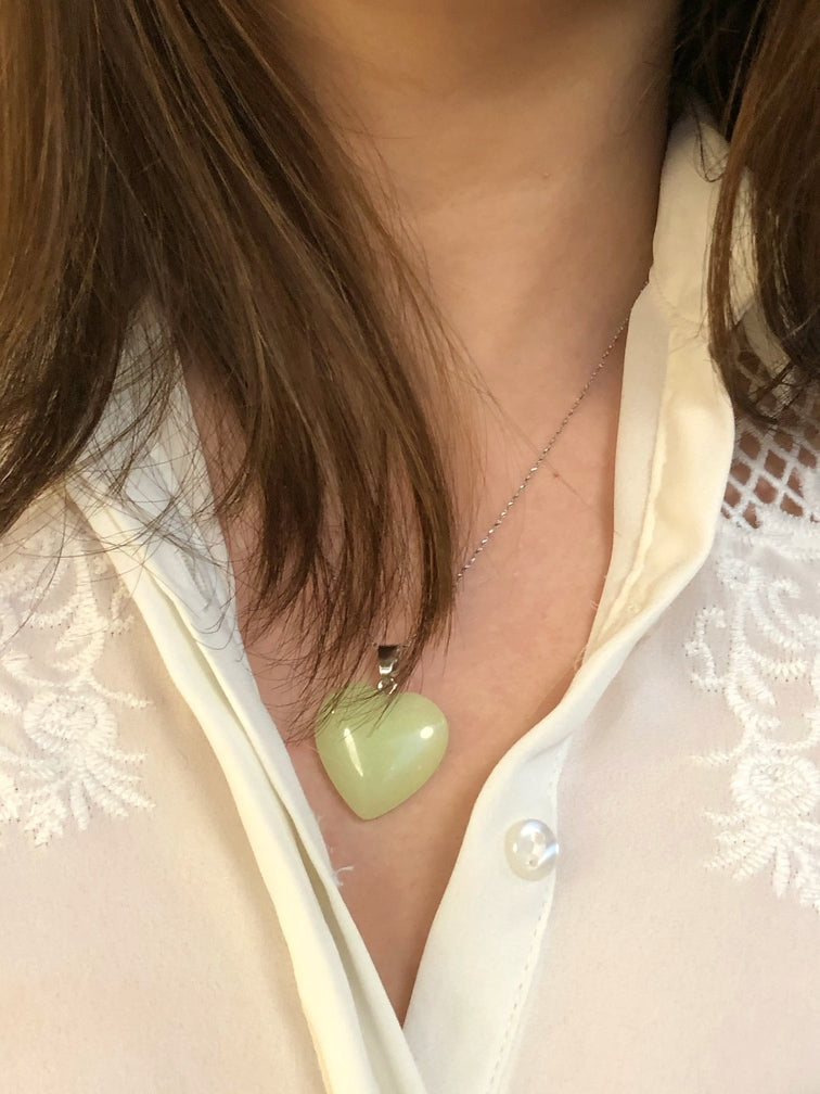Glowing heart pendant in dark