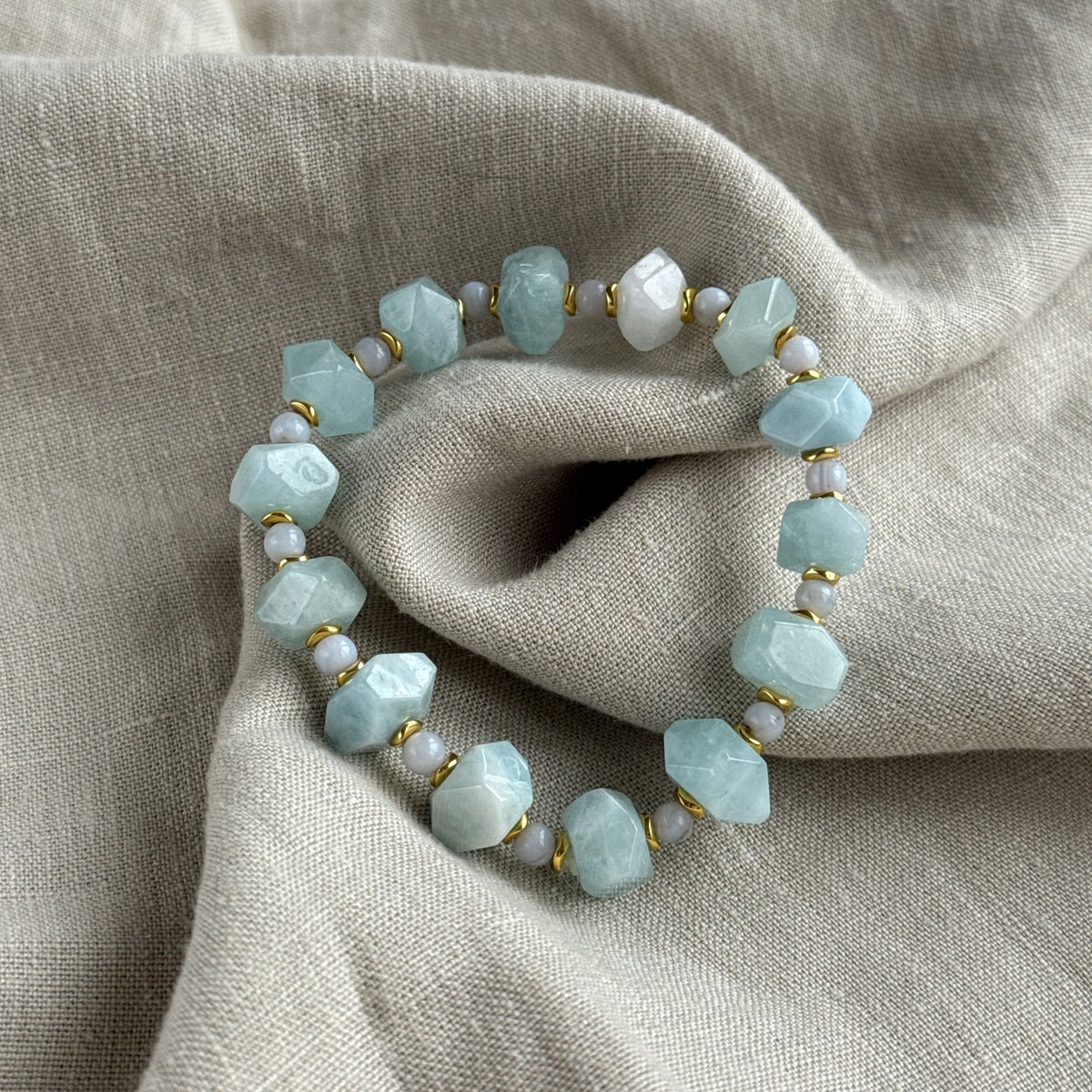 AQUA SERENITY | Faceted Aquamarine Bracelet with Gold Accents
