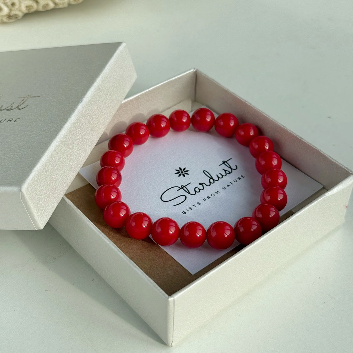 5a Red 8mm Smooth Round Coral Bracelet