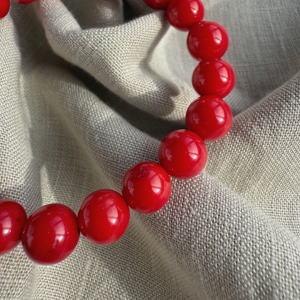 5a Red 8mm Smooth Round Coral Bracelet