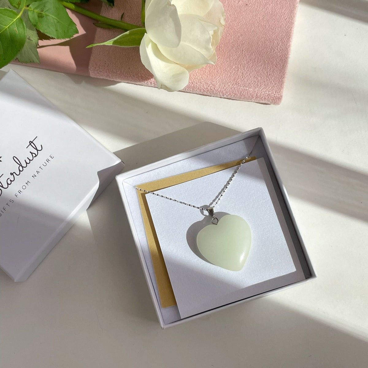 Glowing heart pendant in dark
