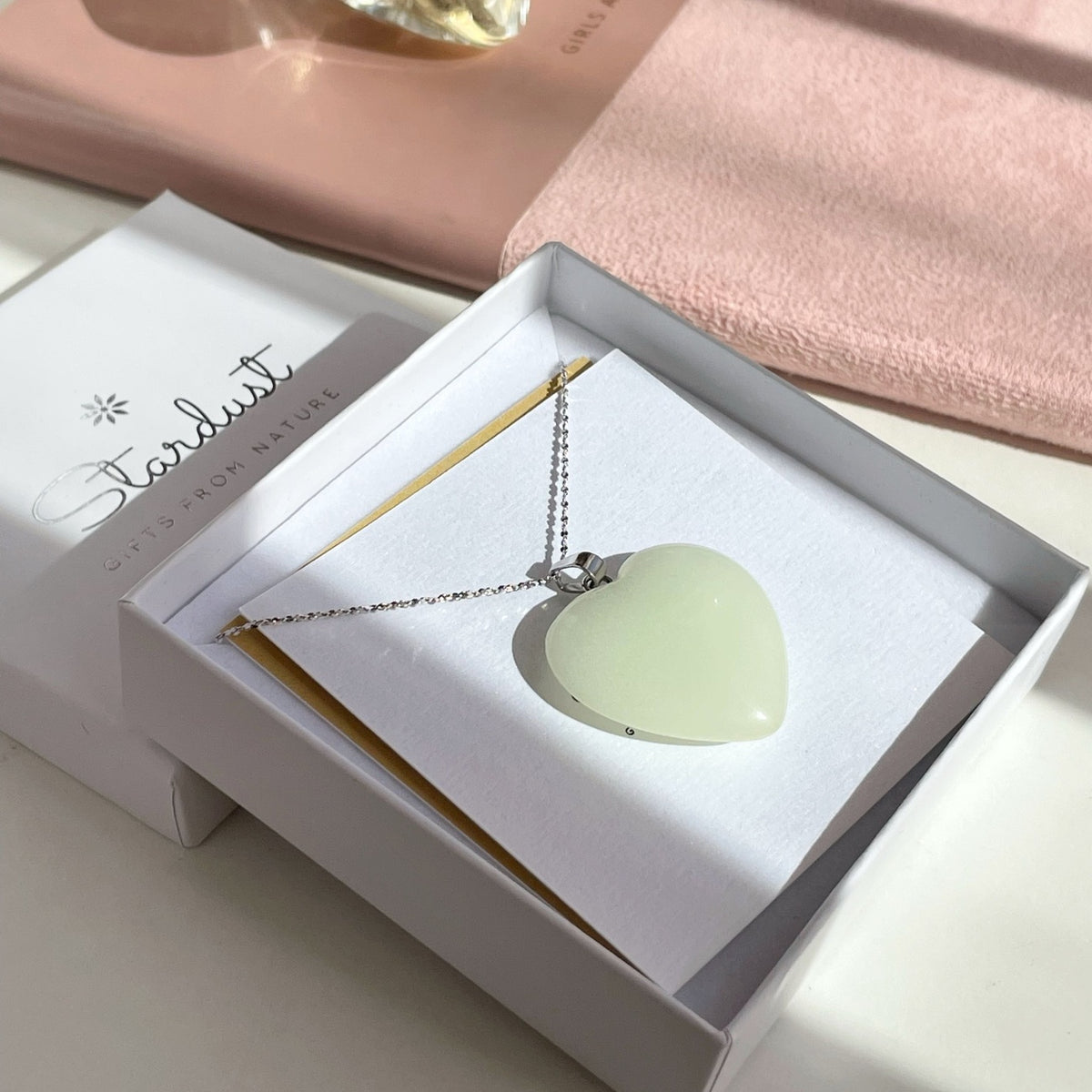Glowing heart pendant in dark