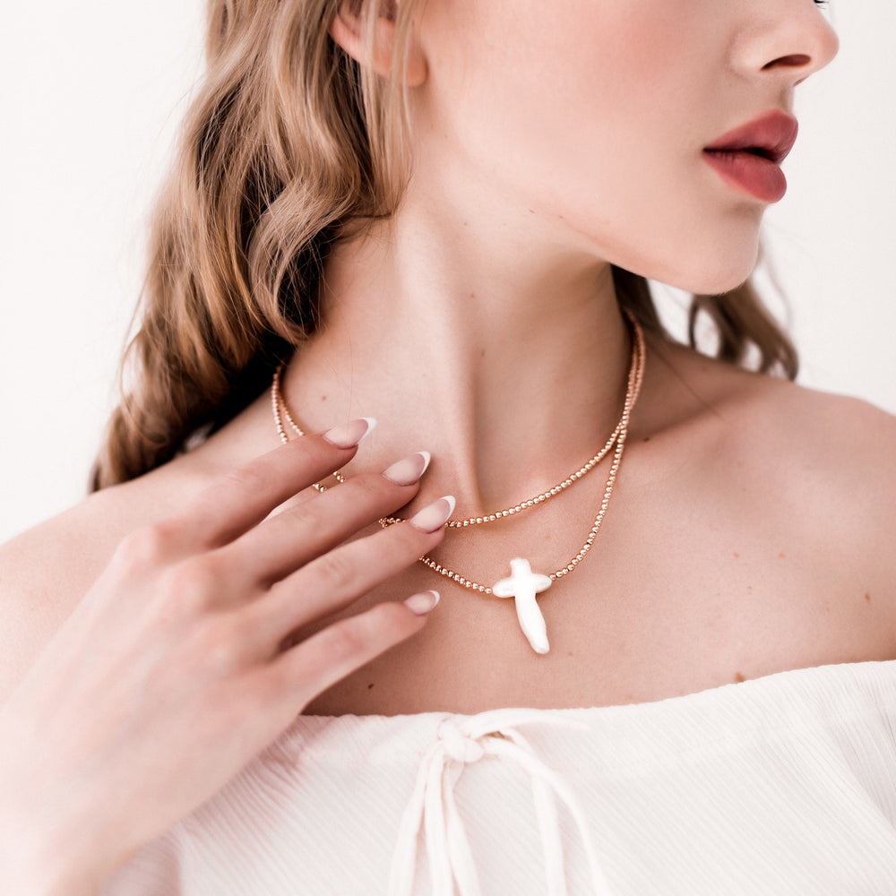 QUIET ELEGANCE | Natural Shell Cross Necklace – Rose Gold Hematite