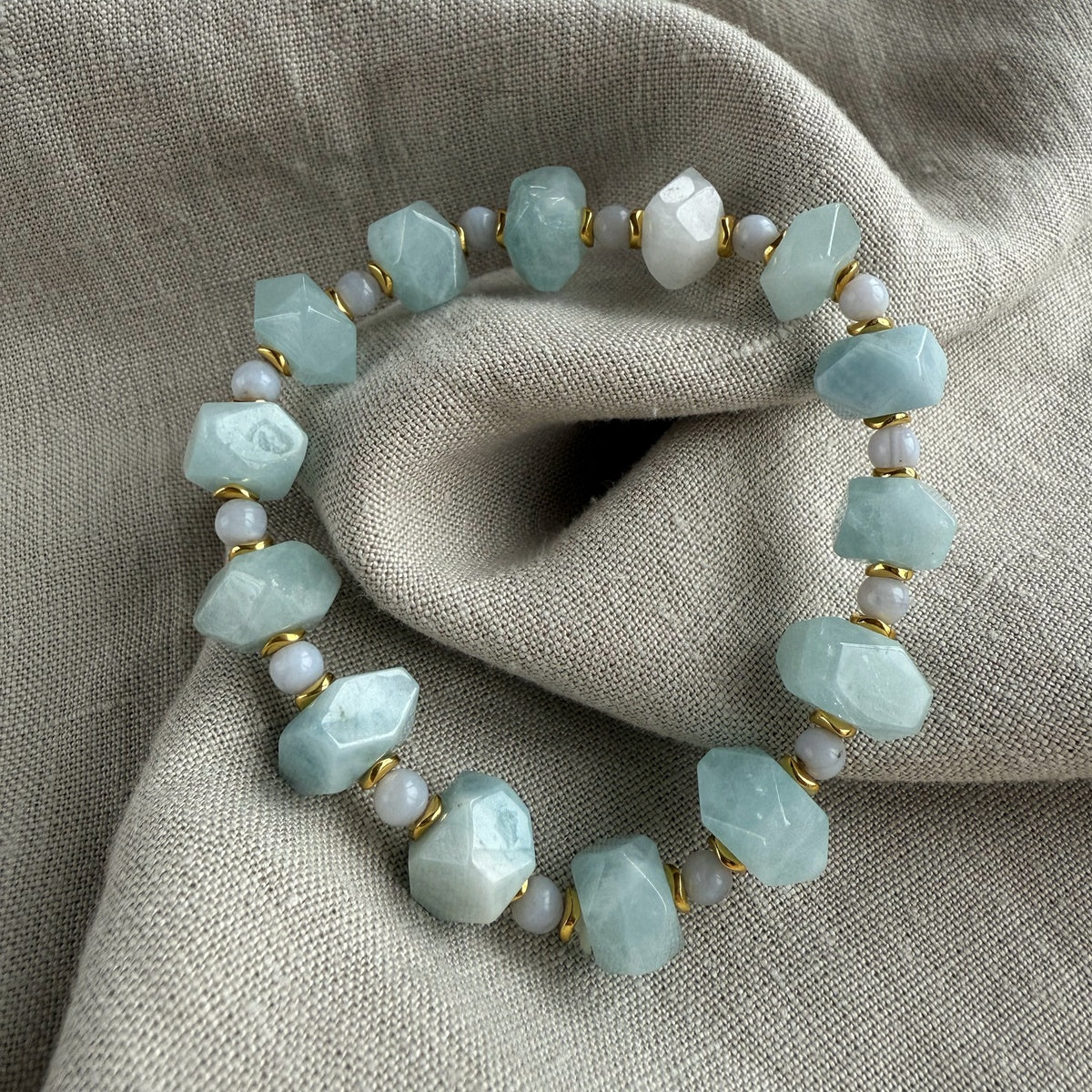 AQUA SERENITY | Faceted Aquamarine Bracelet with Gold Accents