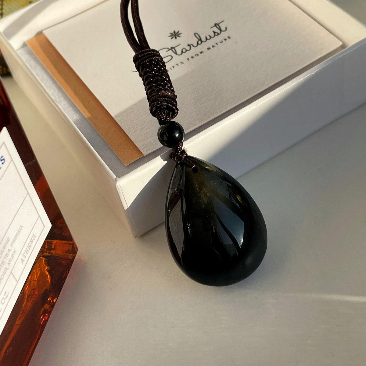 Natural Sheen Obsidian drop pendant necklace on silk rope