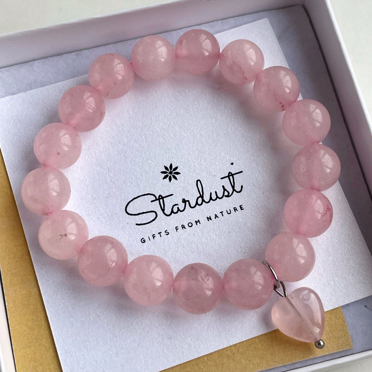 Rose Quartz beaded bracelet 10mm with heart charm