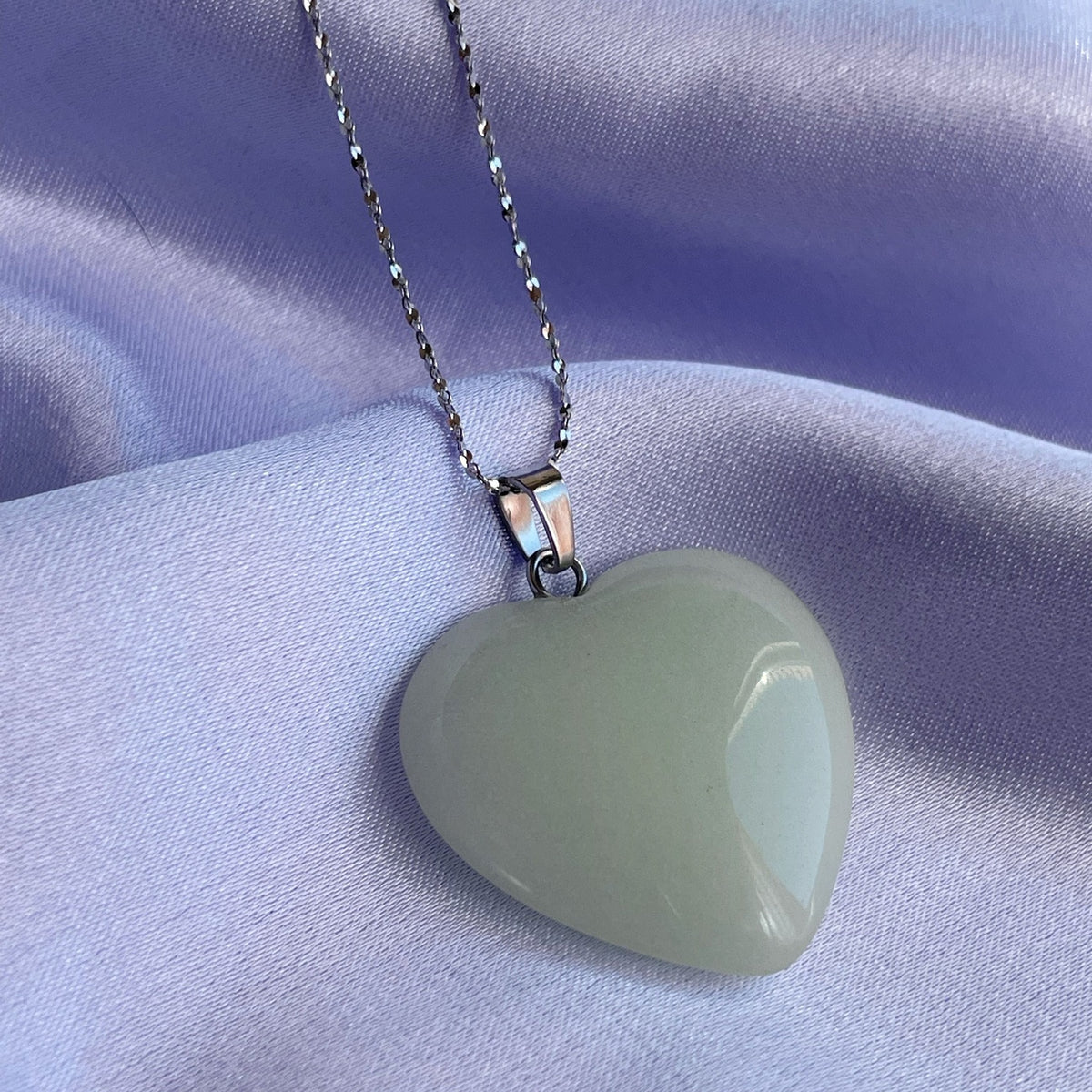 Glowing heart pendant in dark