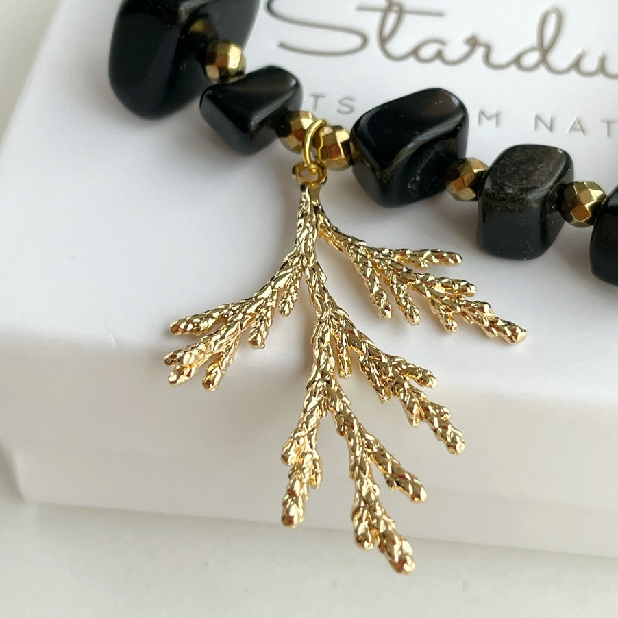 Obsidian bracelet for women with gold coral charm