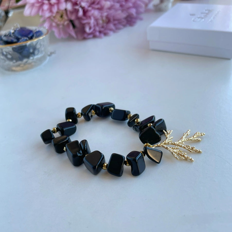 Obsidian bracelet for women with gold coral charm
