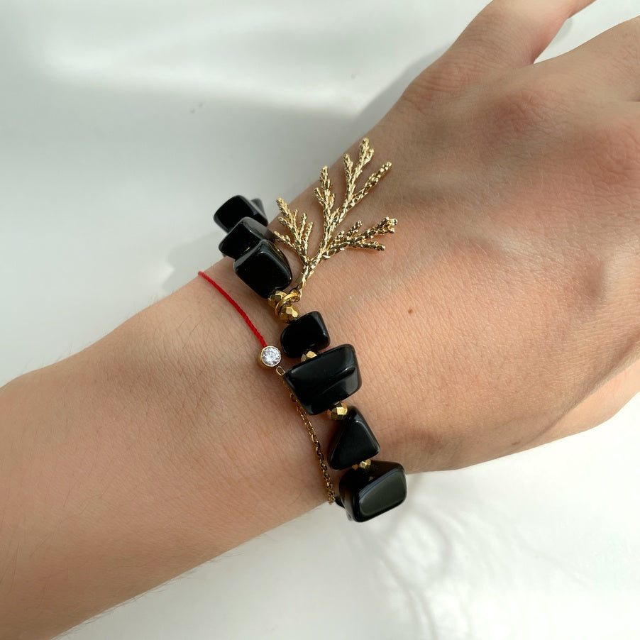 Obsidian bracelet for women with gold coral charm