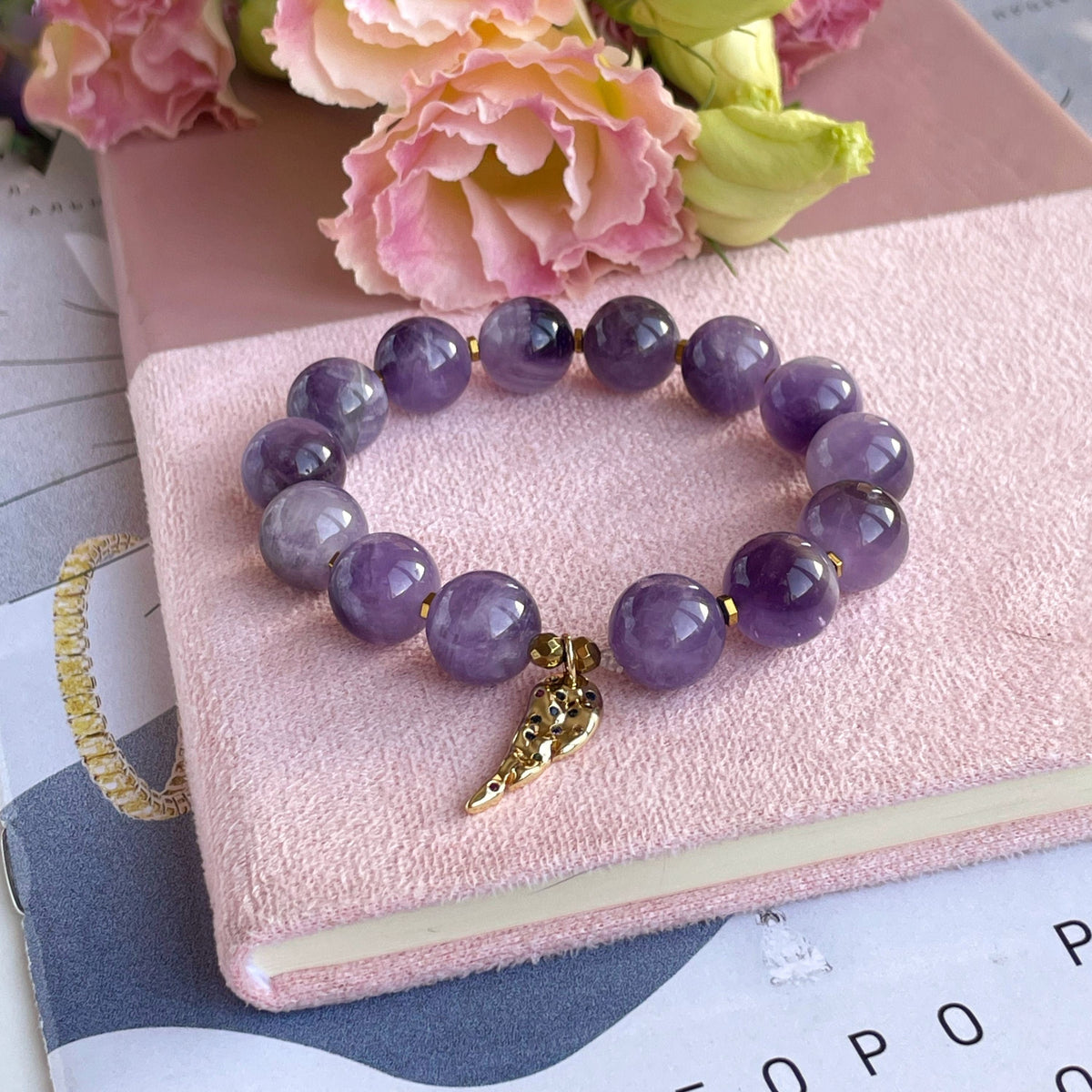 Genuine Amethyst beaded bracelet with Gold feather charm