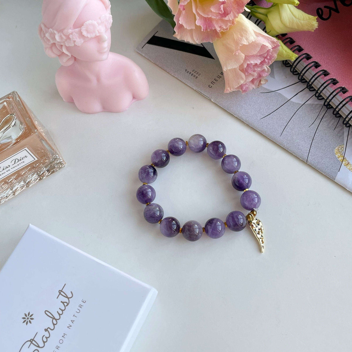 Genuine Amethyst beaded bracelet with Gold feather charm