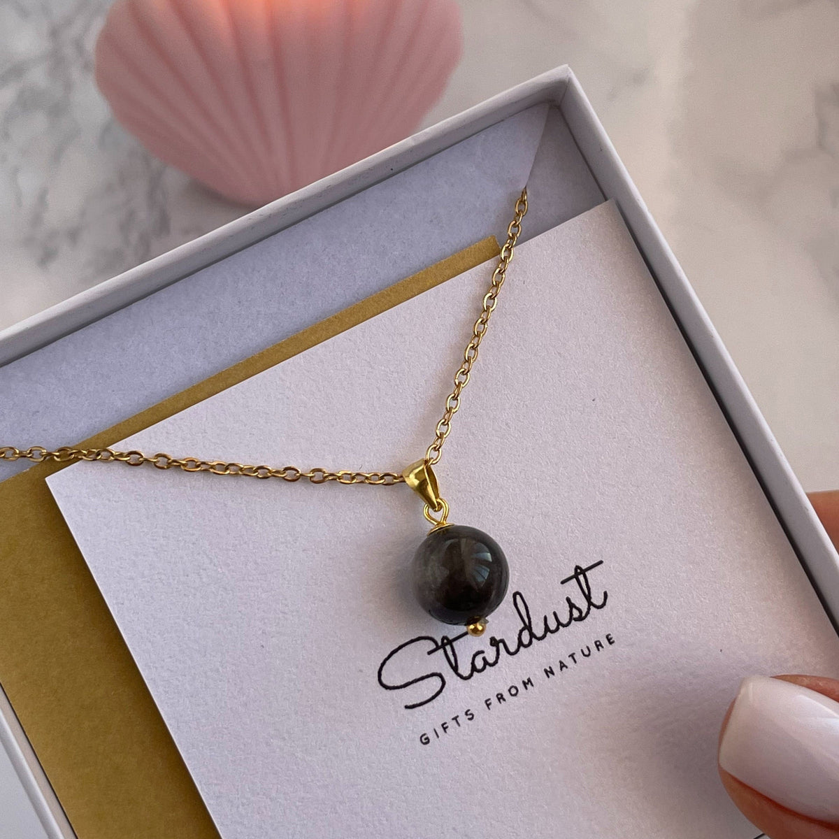 Small round Black Sheen Obsidian pendant