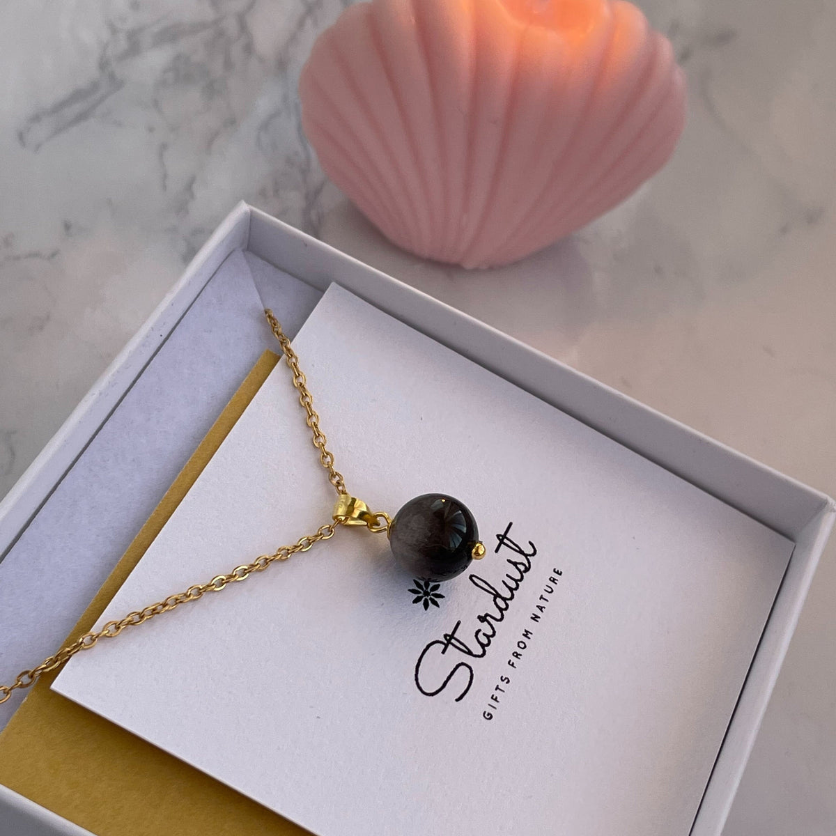 Small round Black Sheen Obsidian pendant