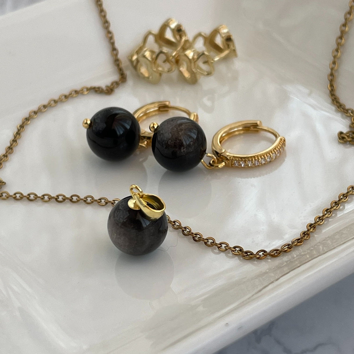 Small round Black Sheen Obsidian pendant