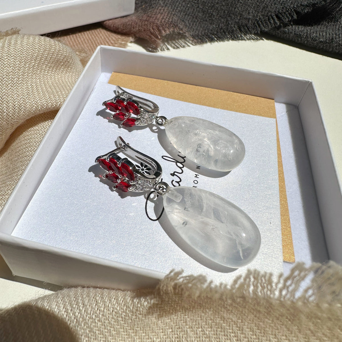 Natural Clear Quartz Drop Earrings with Red Zircons