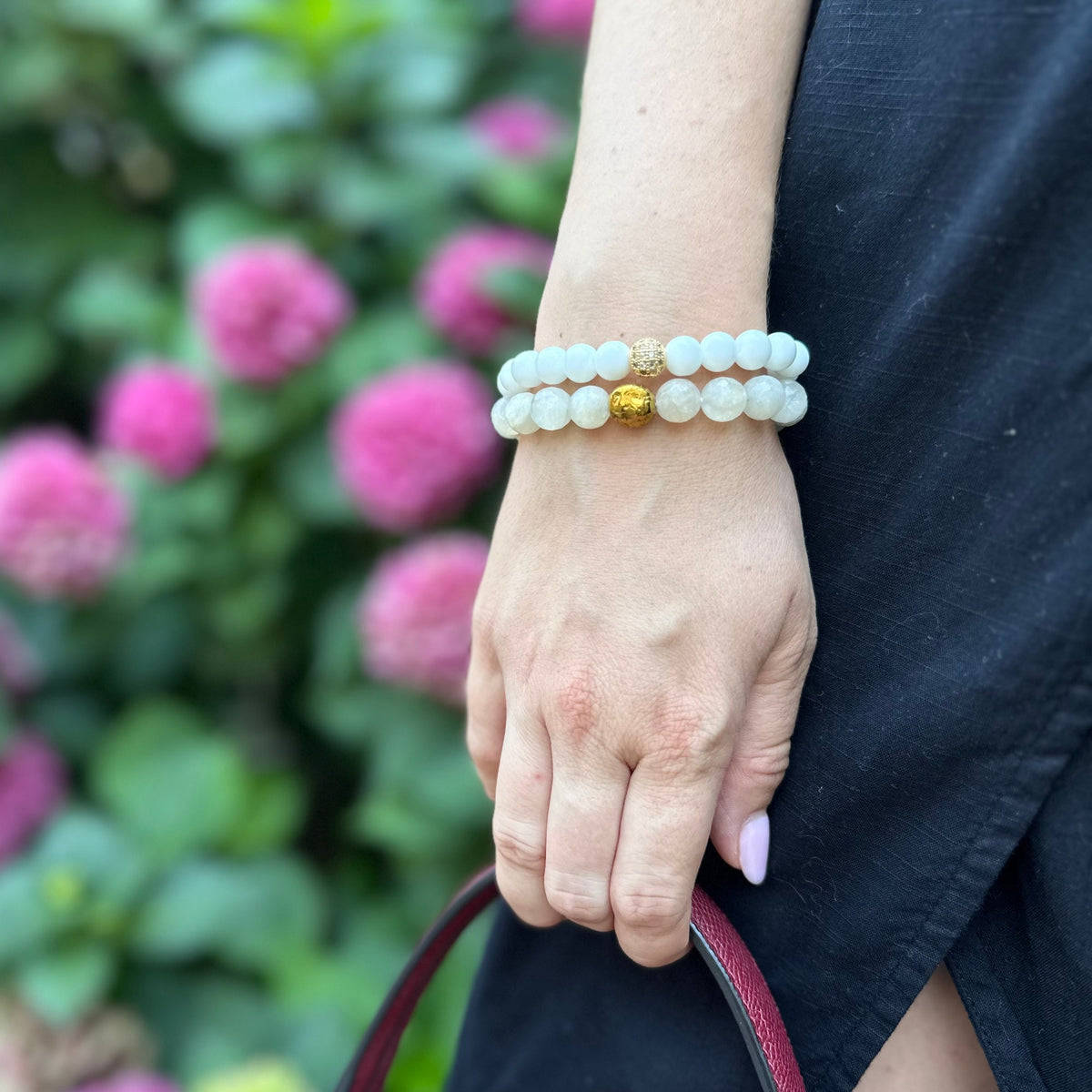 Moonstone and white agate bracelet set with gold lion charm