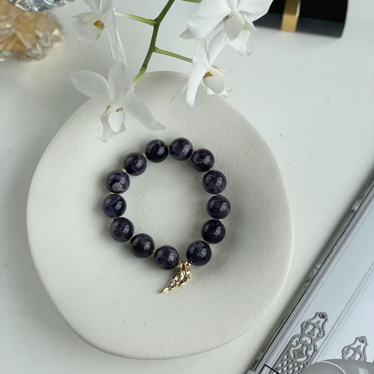 Genuine Amethyst beaded bracelet with Gold feather charm