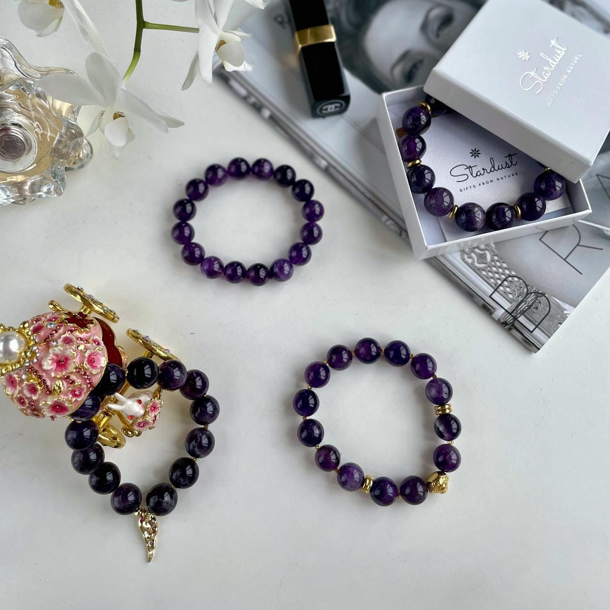 Genuine Amethyst beaded bracelet with Gold feather charm