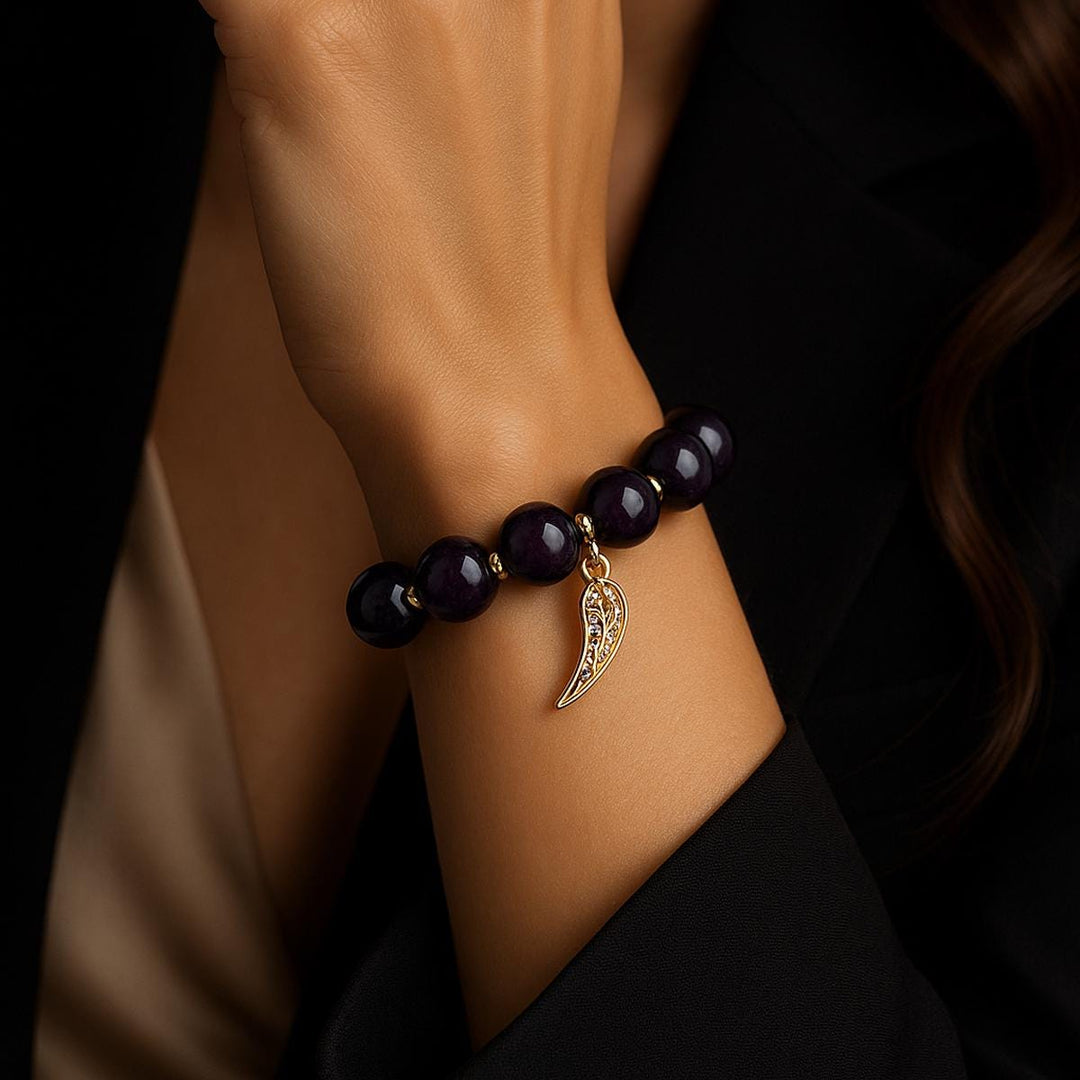 Genuine Amethyst beaded bracelet with Gold feather charm