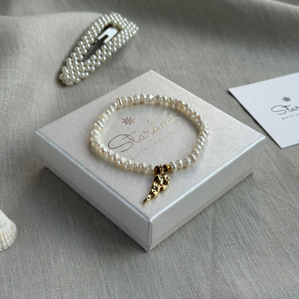 ANGEL | Freshwater Pearl Bracelet with Gold Feather Charm