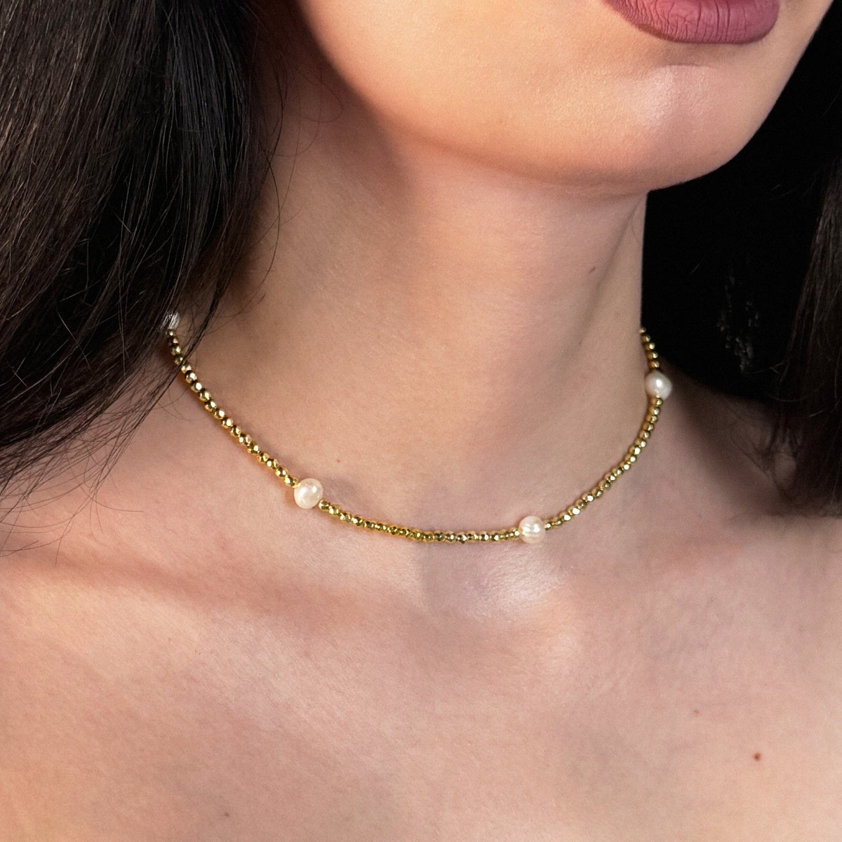 Luxury pearl choker with golden hematite