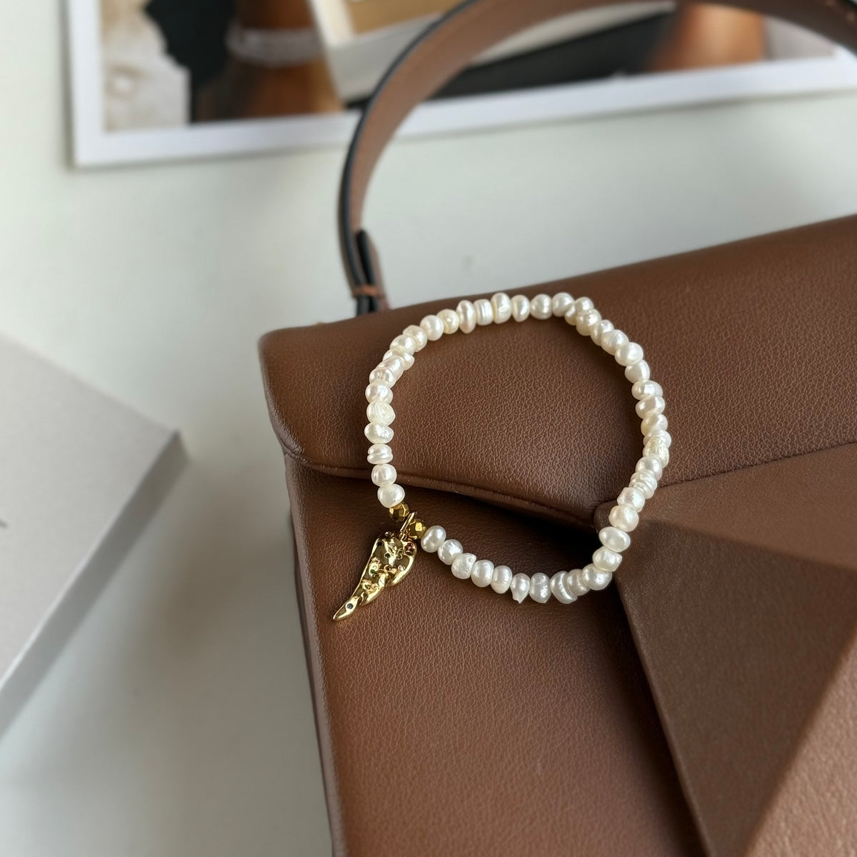 ANGEL | Freshwater Pearl Bracelet with Gold Feather Charm