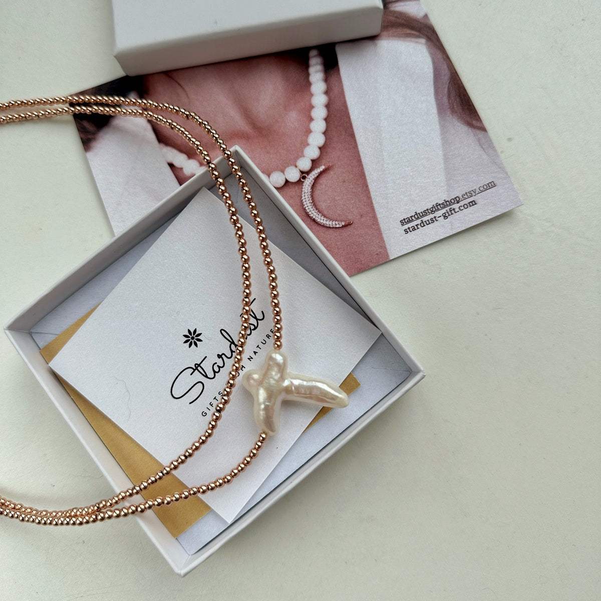 QUIET ELEGANCE | Natural Shell Cross Necklace – Rose Gold Hematite