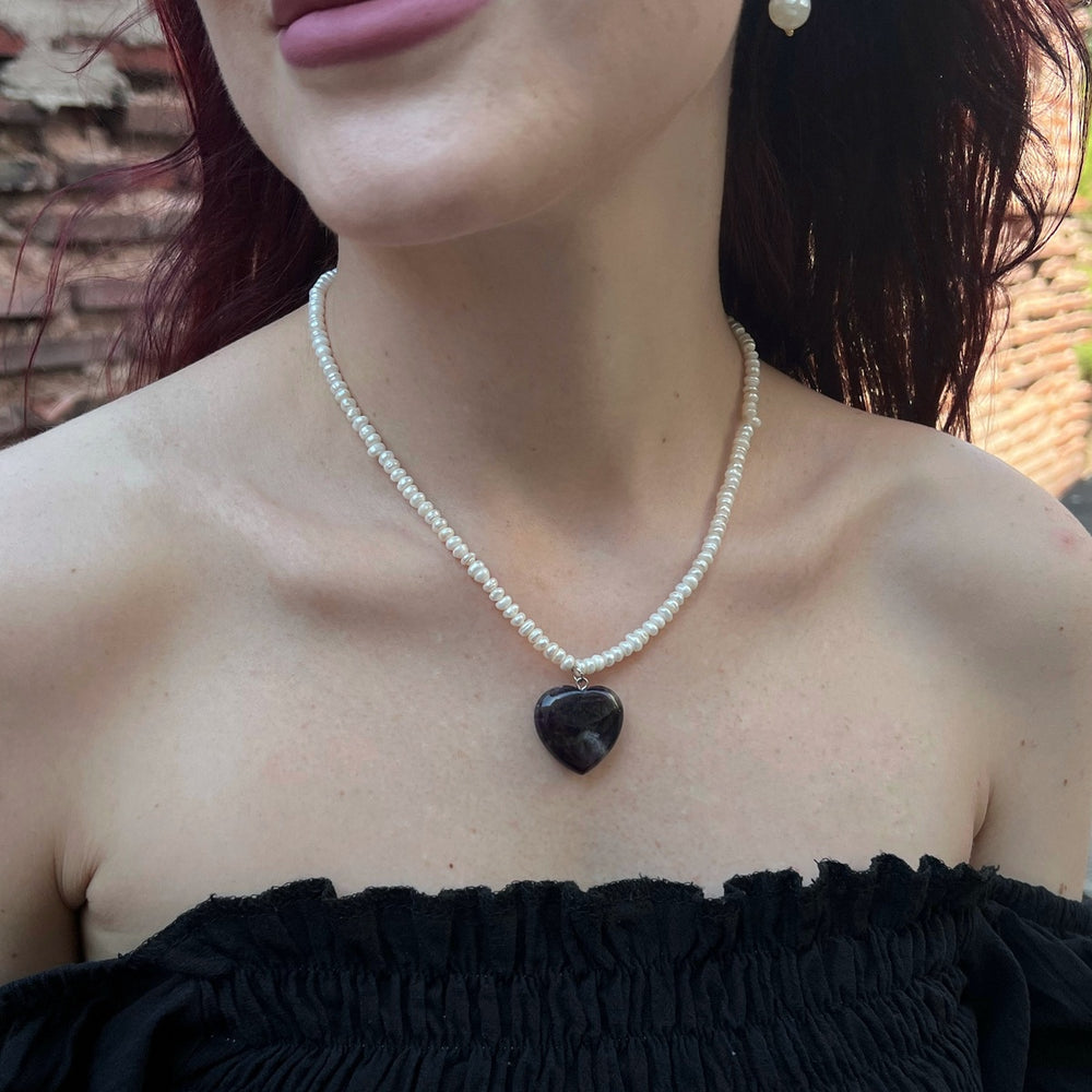 White pearl choker with natural amethyst heart
