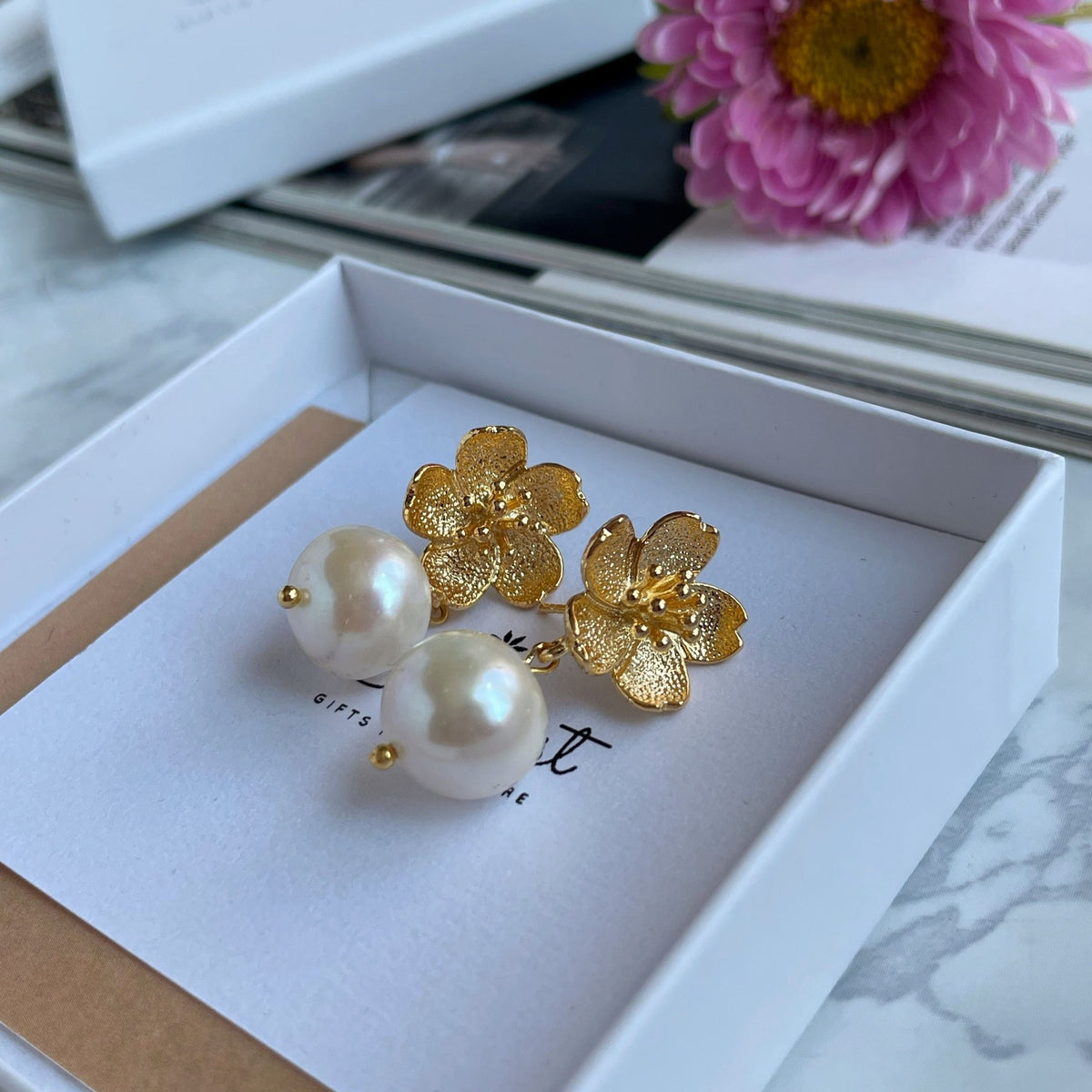 Elegant White Pearl Earrings with gold flowers