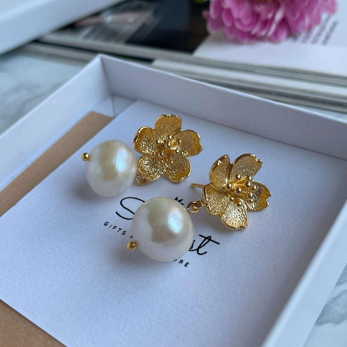 Elegant White Pearl Earrings with gold flowers