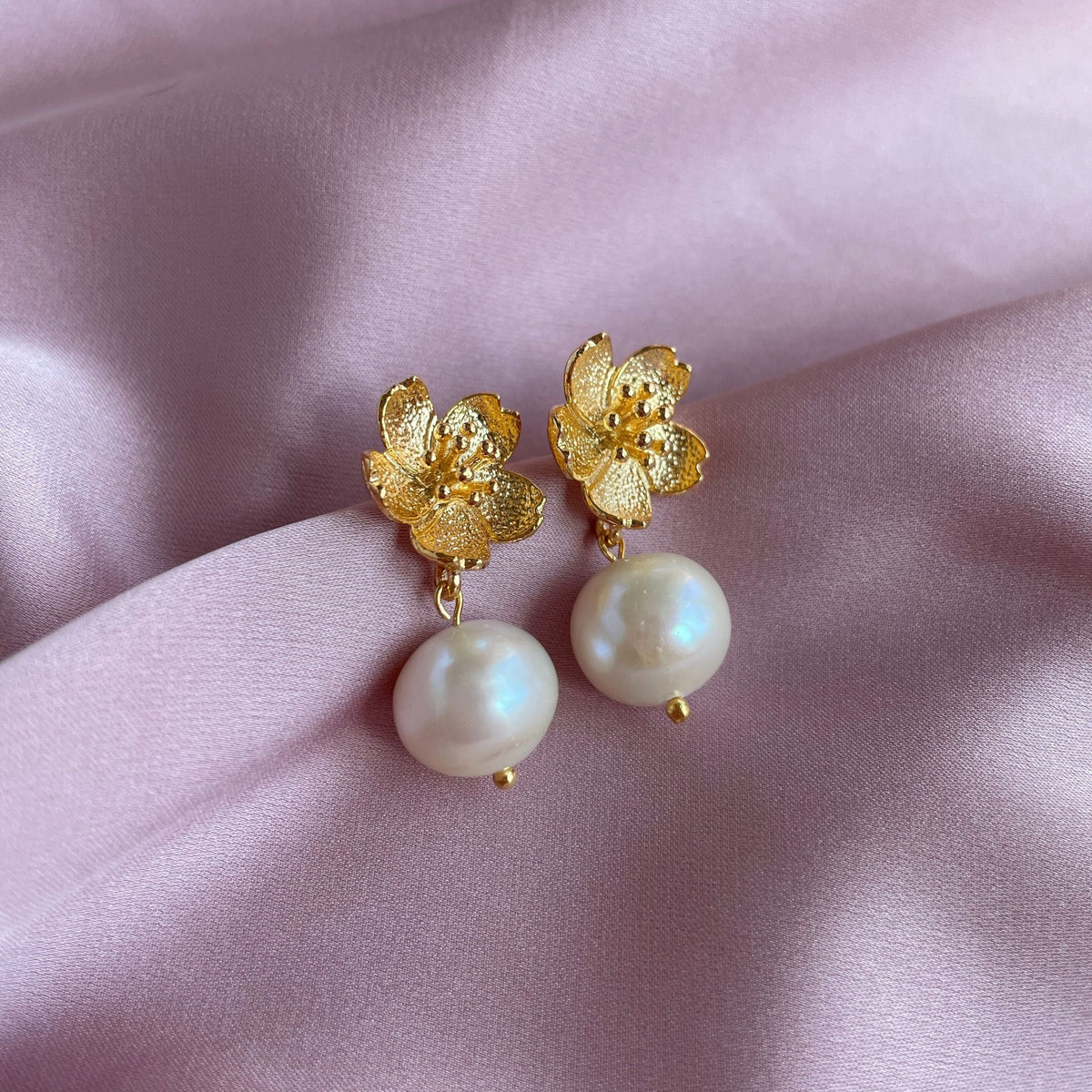 Elegant White Pearl Earrings with gold flowers