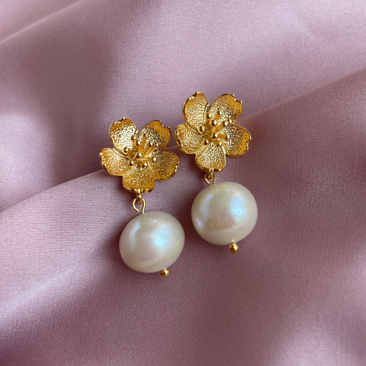 Elegant White Pearl Earrings with gold flowers