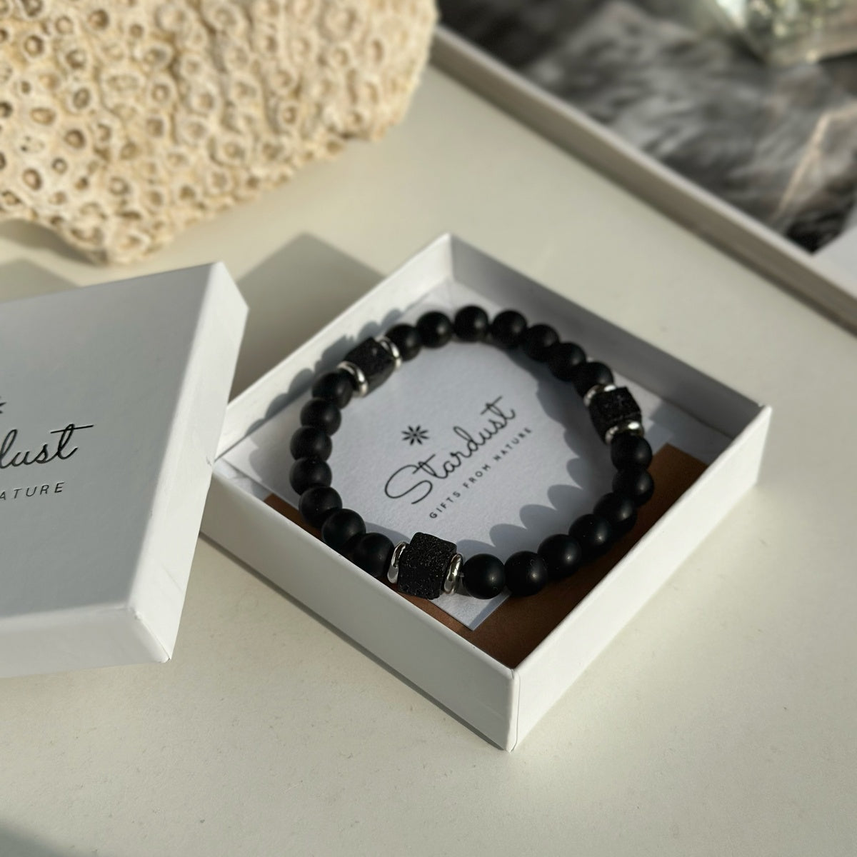 Snowflake Obsidian and Rutilated Quartz beaded bracelet 12mm