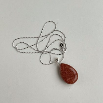 Small Goldstone pendant