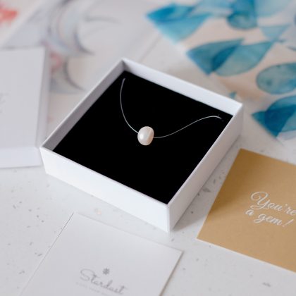 Genuine pearl choker on transparent cord, floating pearl pendant, single pearl necklace