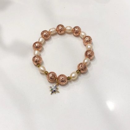 Rose gold and pearl bracelet