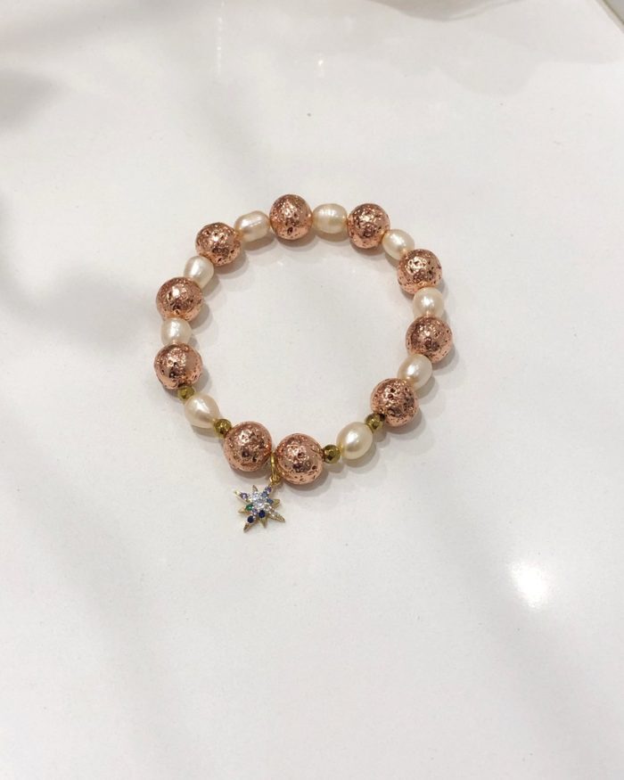 "Shining north star" - Rose Gold lava stone with pearls bracelet, zircon charm