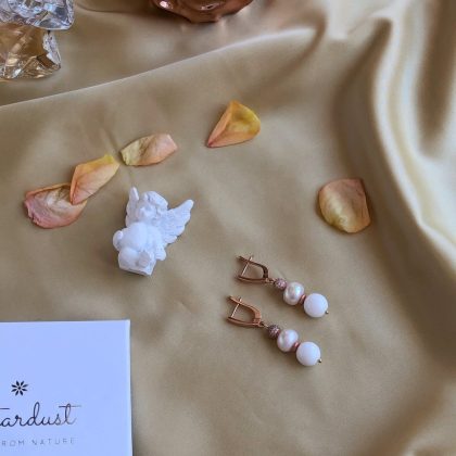 White and rose gold earrings