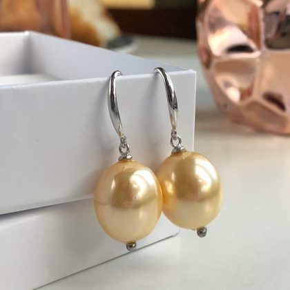 Oval pearl earrings silver with zircons