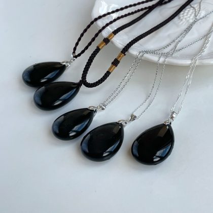 Obsidian pendants for her and for him