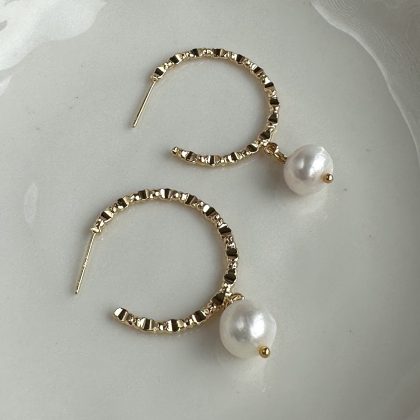 Gold hoop earrings with pearls