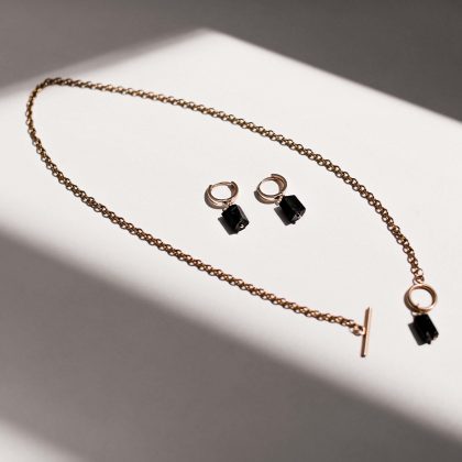 Minimalist gold chain necklace with black crystal