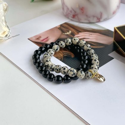 Dalmatian jasper and black onyx bracelets